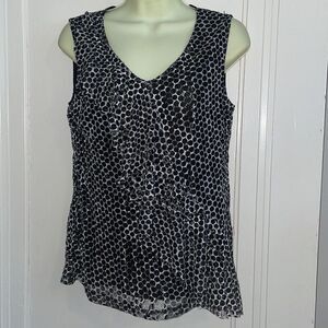 Chico’s white with black polka dots sleeveless blouse with ruffle across front